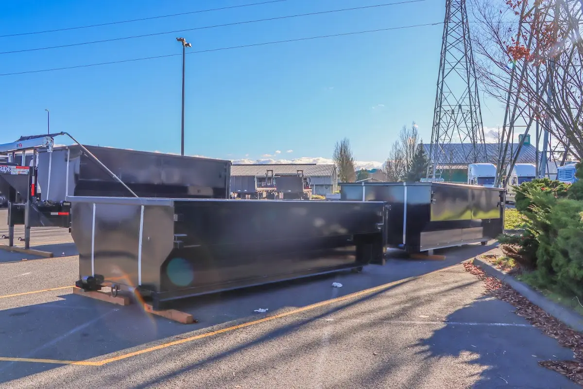 Roll-off dumpster ready for waste disposal at job site for 3 Yard Dumpster Rental in Green